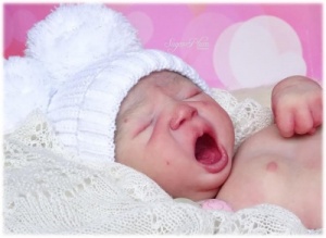 LEILANI YAWNING  Realborn